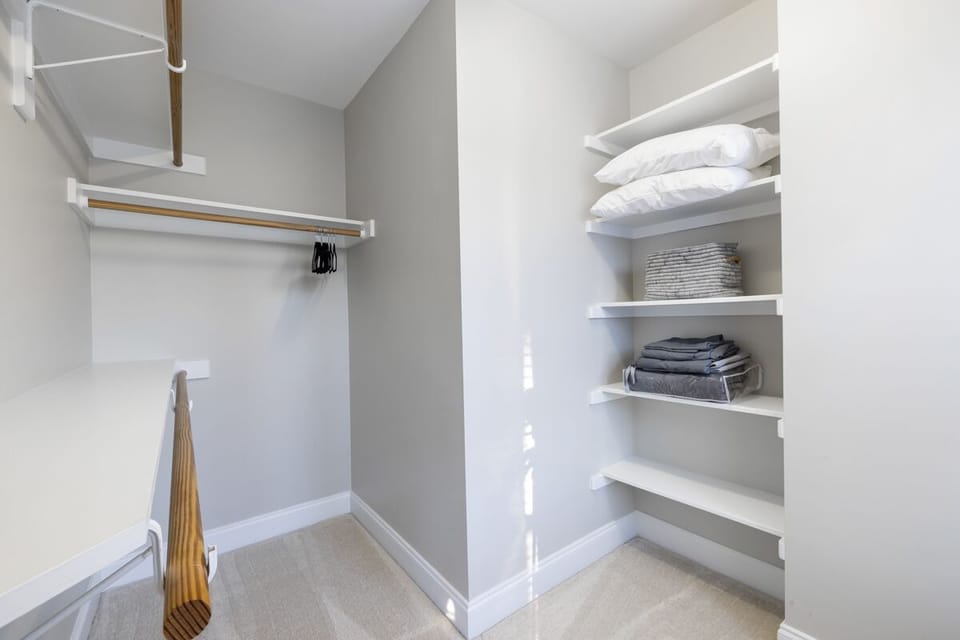 Primary walk-in closet space