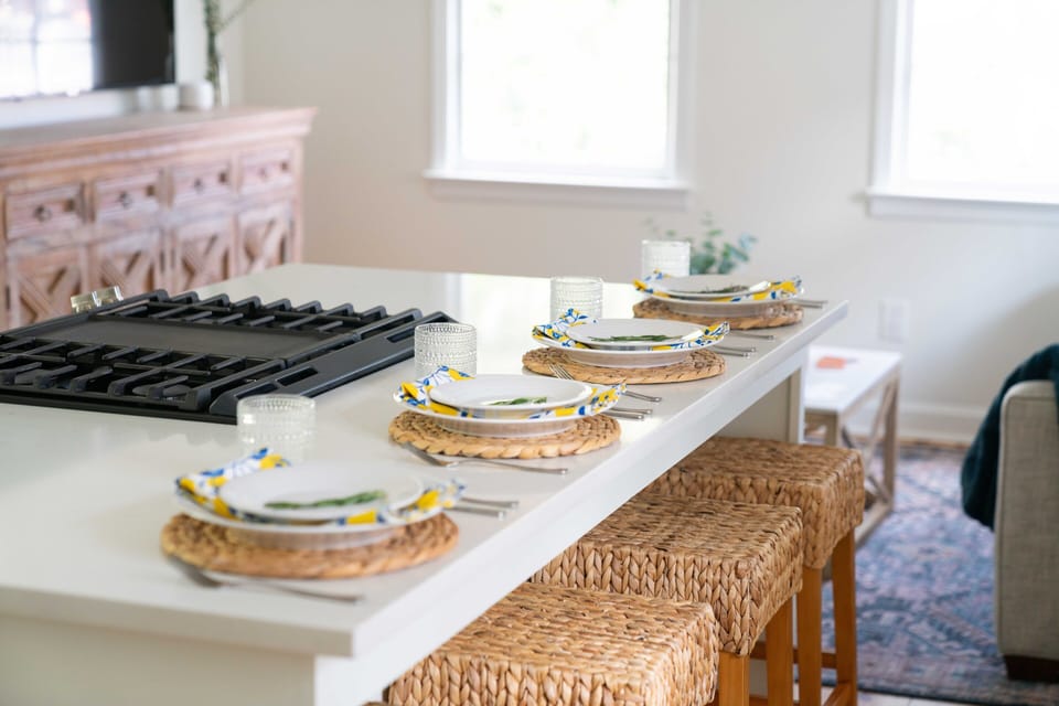 Fully stocked chef's kitchen with island seating