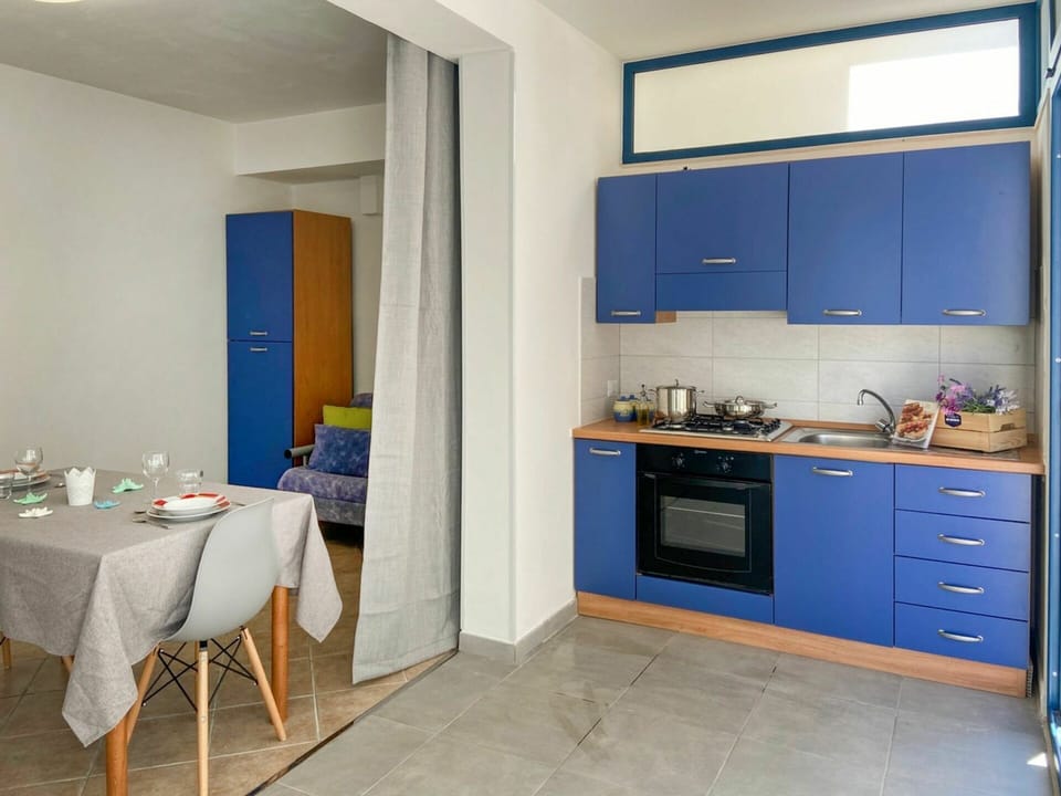 Countertop, Cabinetry, Furniture, Property, Blue, Azure, Kitchen Sink, Building, Kitchen Stove, Kitchen Appliance