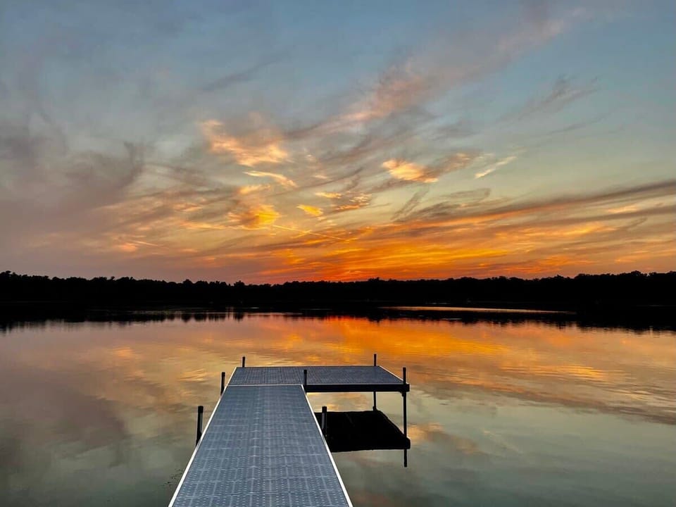 Sunset over Upper Scott Lake private dock