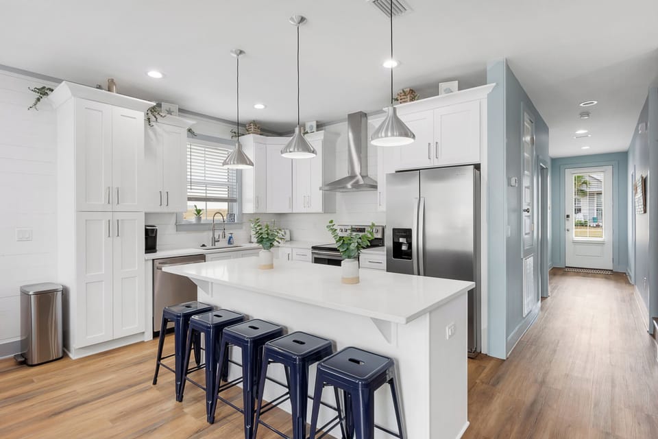 1st Floor Kitchen island provides additional seating.