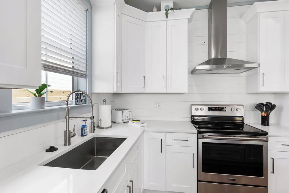 The kitchen is fully stocked with everything you need.
