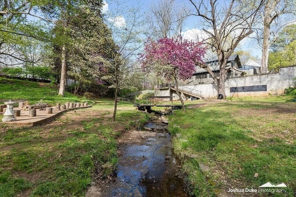 Our back yard is almost a full acre, perfect for gatherings with family and friends. Enjoy our gazebo, the creek with bridge, baggo, tree house, tire swing, fire pit, and more.