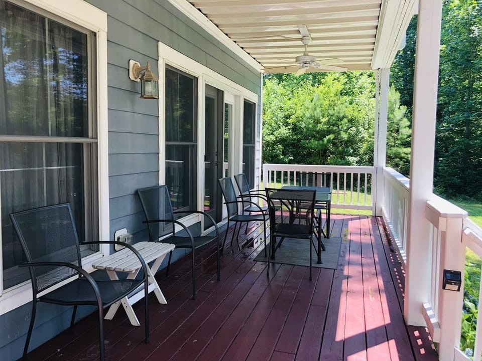 Deck facing Lake - seating for 12 (2 more tables not pictured)