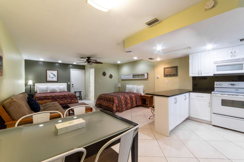 Family Studio Suite, Kitchen | Free WiFi, bed sheets