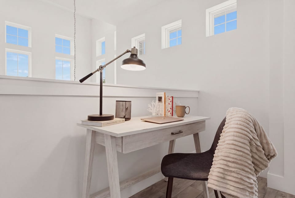 Dedicated workspace with a desk and plenty of natural light for those work-from-beach days.
