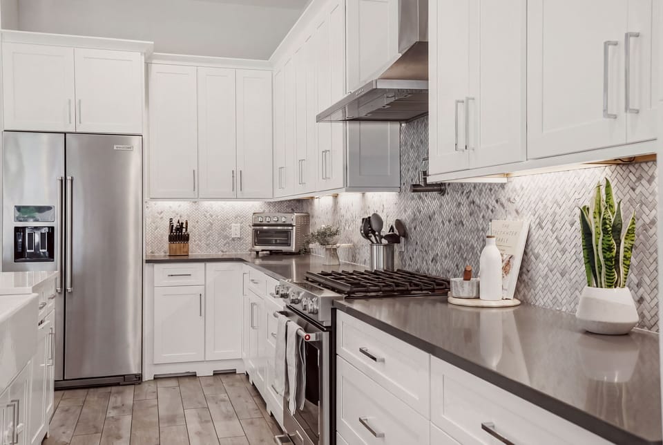 Fully stocked kitchen with spacious cabinetry and everything you need for easy meals and entertaining.