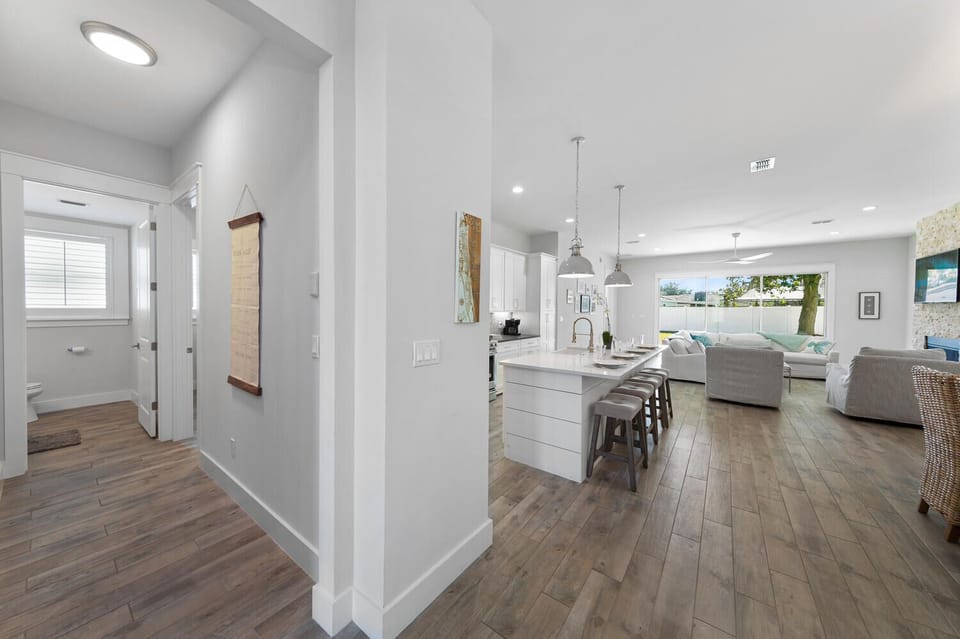 Bright, welcoming entry that opens into the home’s spacious, open-concept living areas.