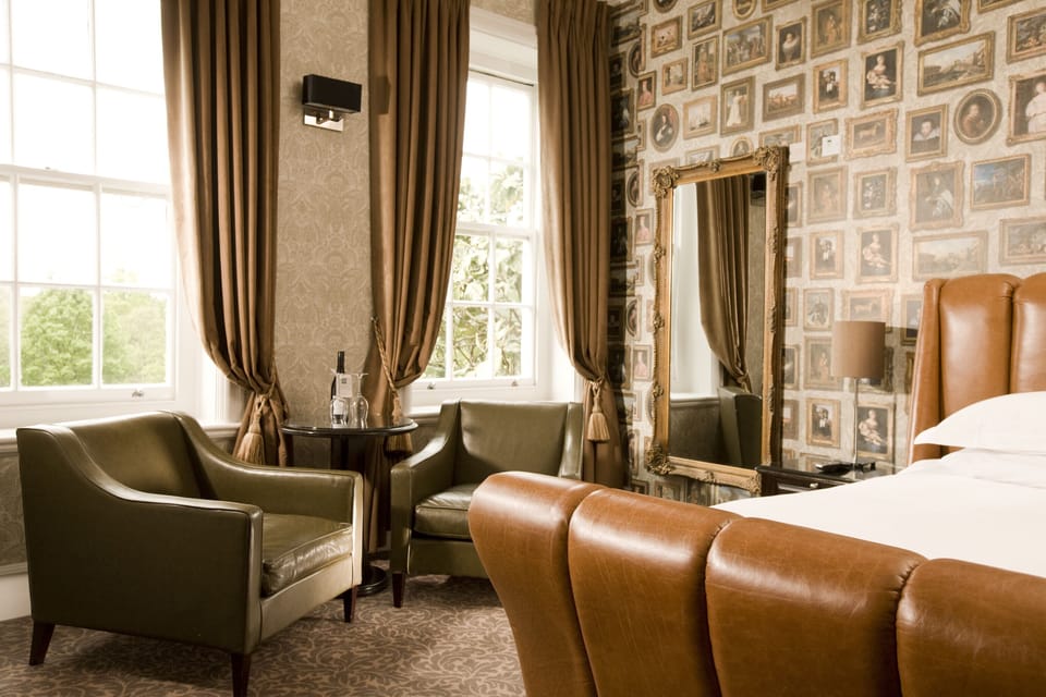 Suite | In-room safe, individually decorated, desk, laptop workspace