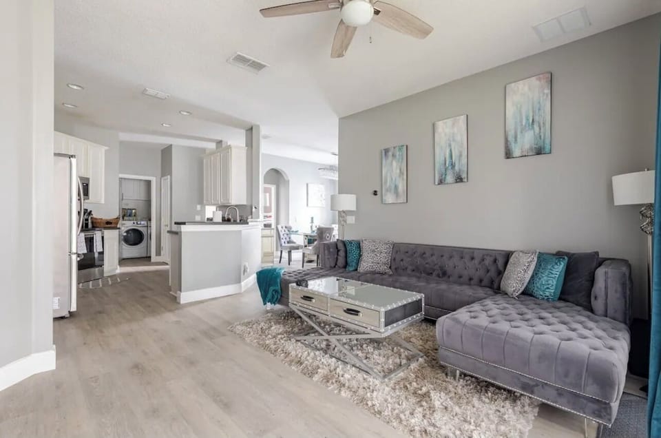 Spacious open-concept living room seamlessly connected to the kitchen—ideal for entertaining, group stays, and effortless flow.
