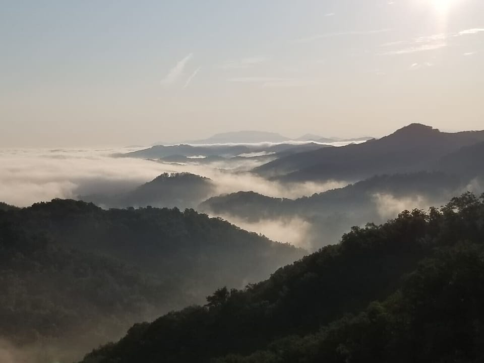 Panoramic mountain view of smoke on the maountains