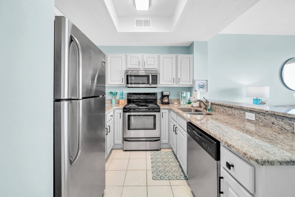Your fully equipped kitchen features stainless steel appliances, granite counters, and everything you need to cook meals at home.