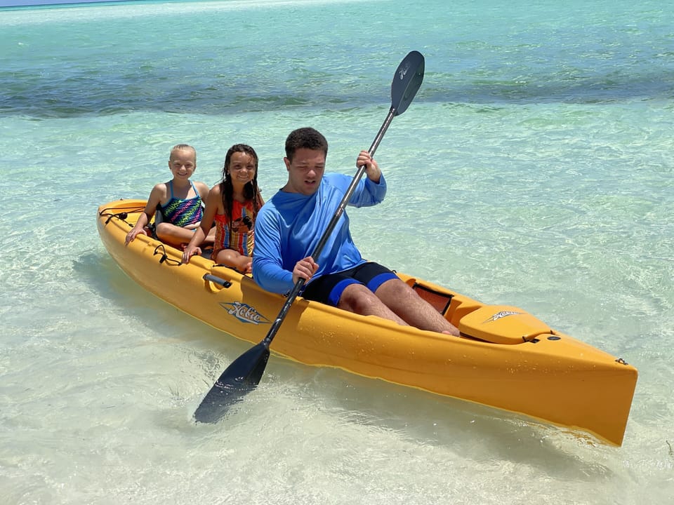 Two seater kayak. A paddle board.  For your pleasure. 