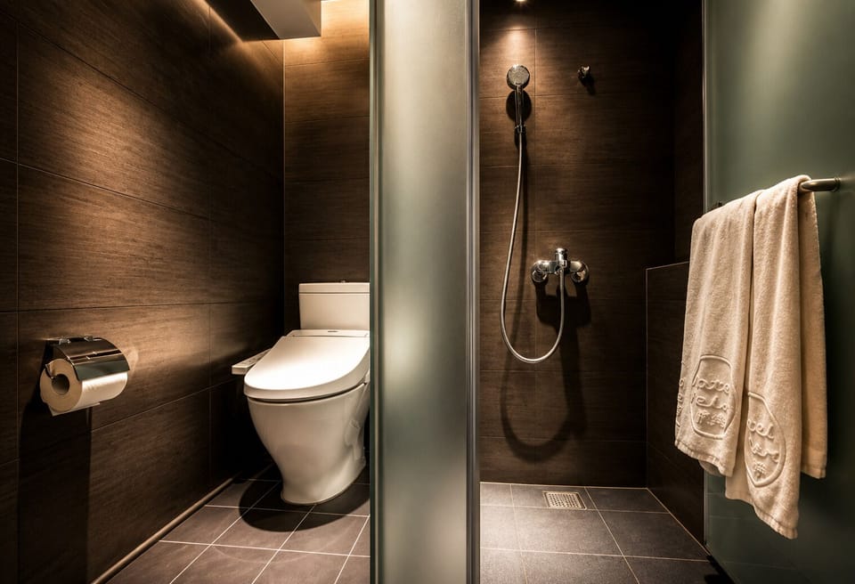 Executive Triple Room, Higher Floor  | Bathroom | Shower, hair dryer, slippers, bidet