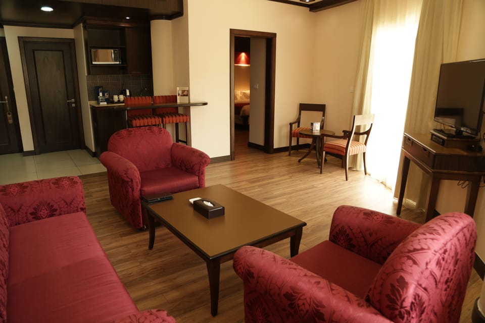Presidential Suite | Private kitchen | Coffee/tea maker, microwave, electric kettle