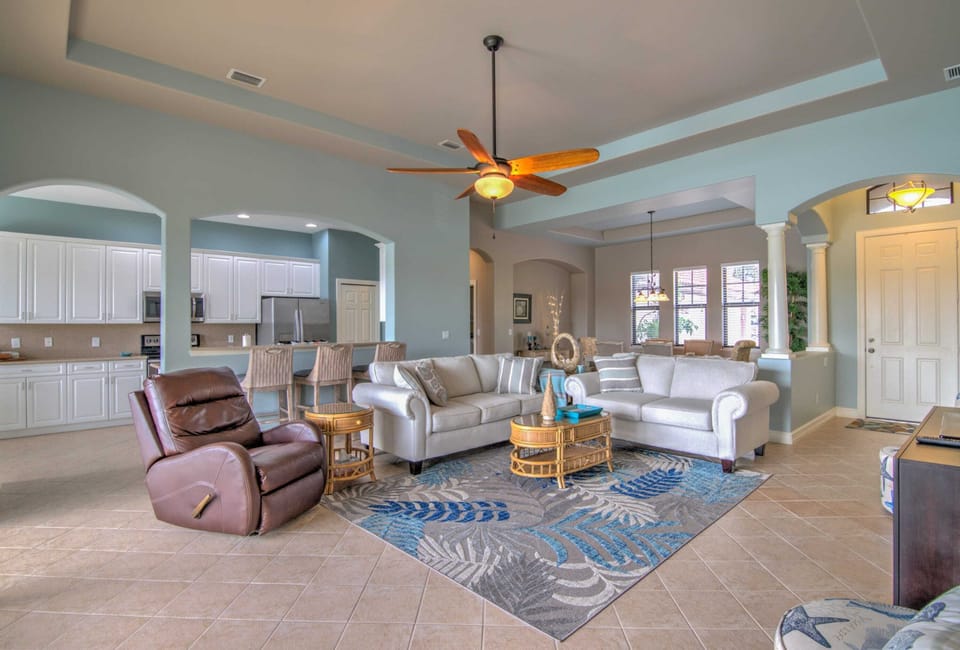 The Home Has a Open Concept with Tall Ceilings and Wonderful Furnishings
