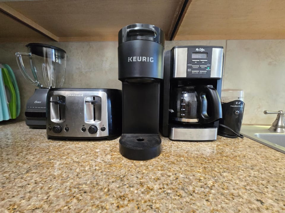 Coffee lovers find two types of coffee makers, plus a grinder for whole beans.