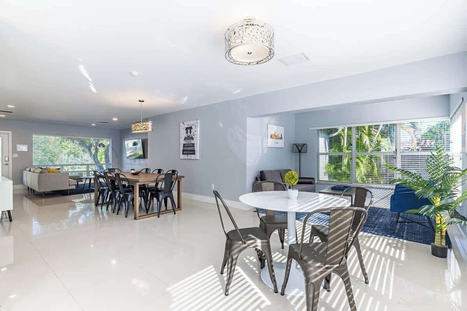 "Bright, modern open-concept living with natural light, stylish dining, and cozy lounge vibes—perfect for remote work, family stays, or group getaways. Your spacious vacation rental retreat awaits!"