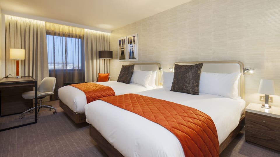 In-room safe, desk, iron/ironing board, free cribs/infant beds