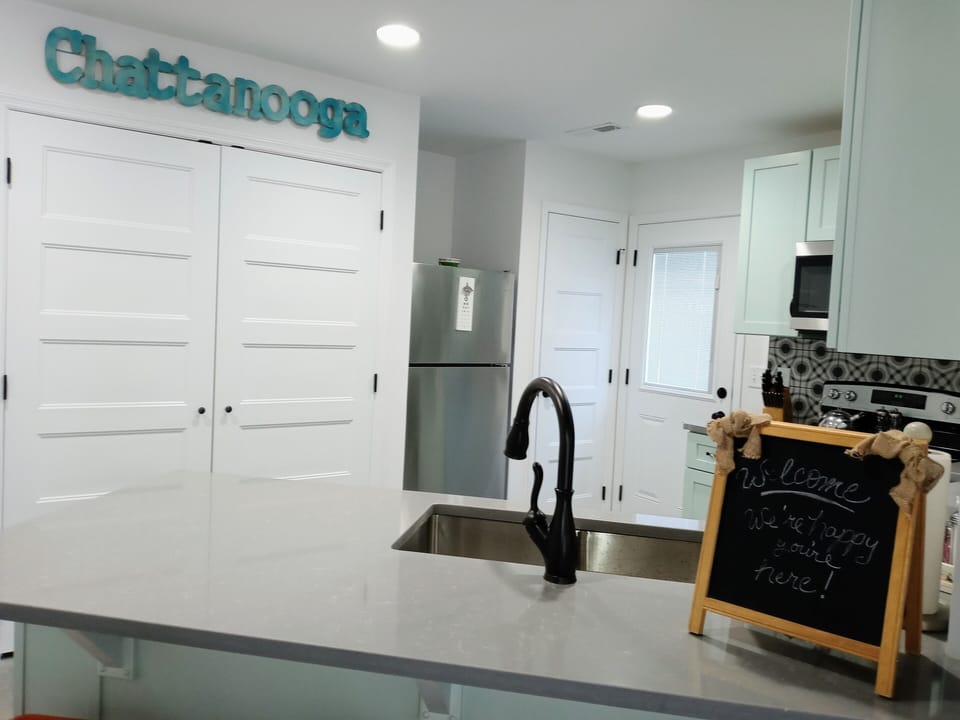 Laundry is on the left and the door goes out on the landing.