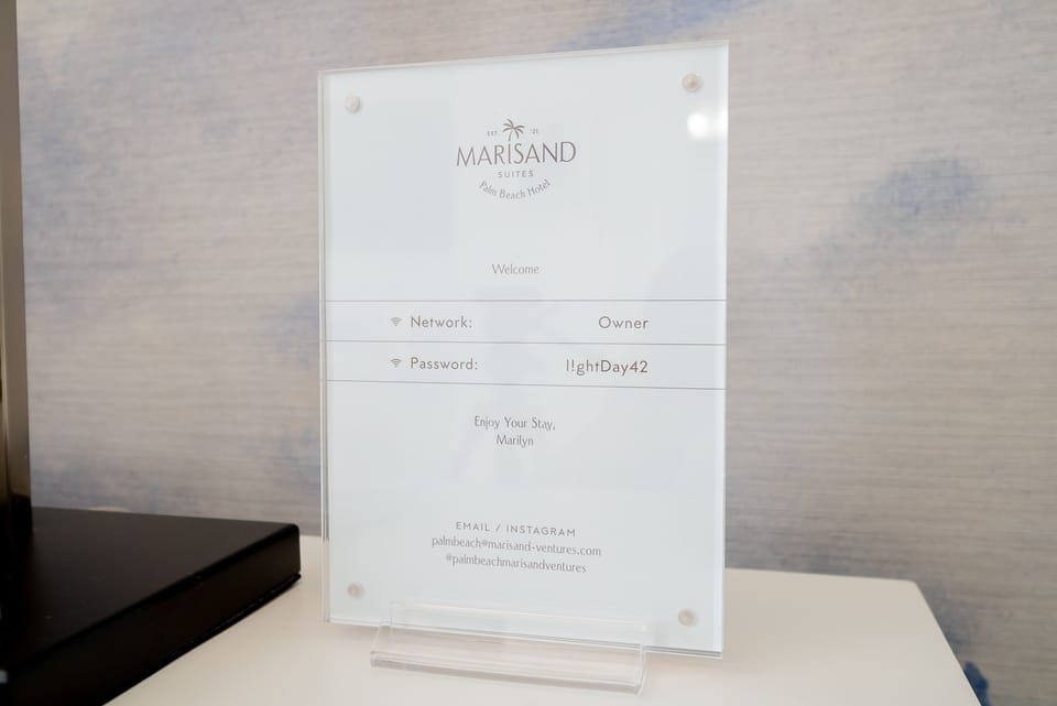 Wifi placard. Also follow Marisand Suites on Instagram.
