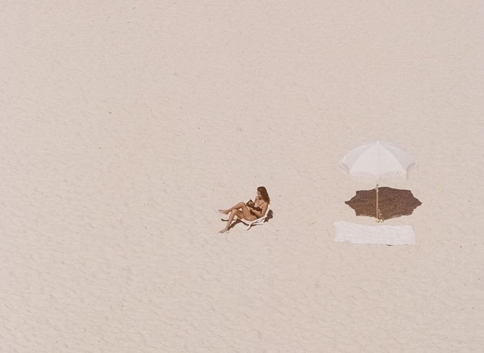 Beach chairs, towels, and umbrella are available for guest's use.