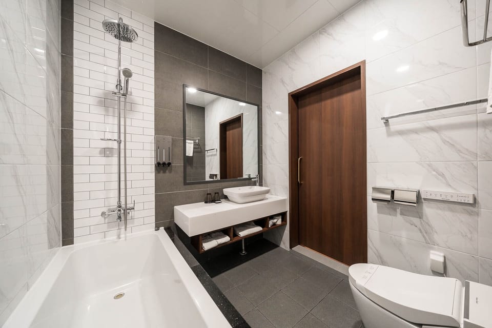 Deluxe Bath Room | Bathroom | Free toiletries, hair dryer, bathrobes, slippers