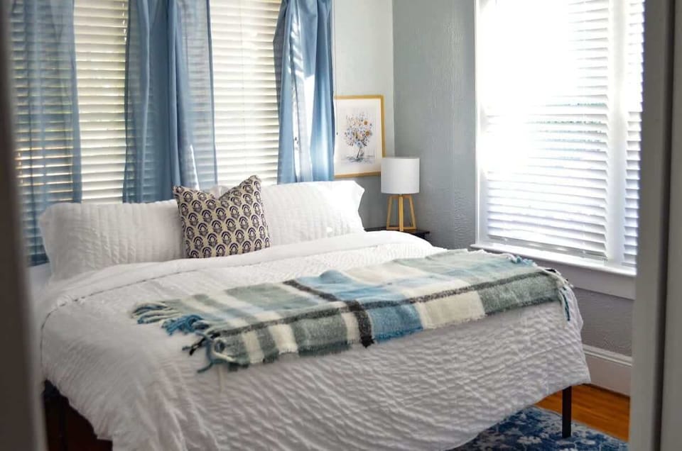 Minimalist Bedroom with tall windows