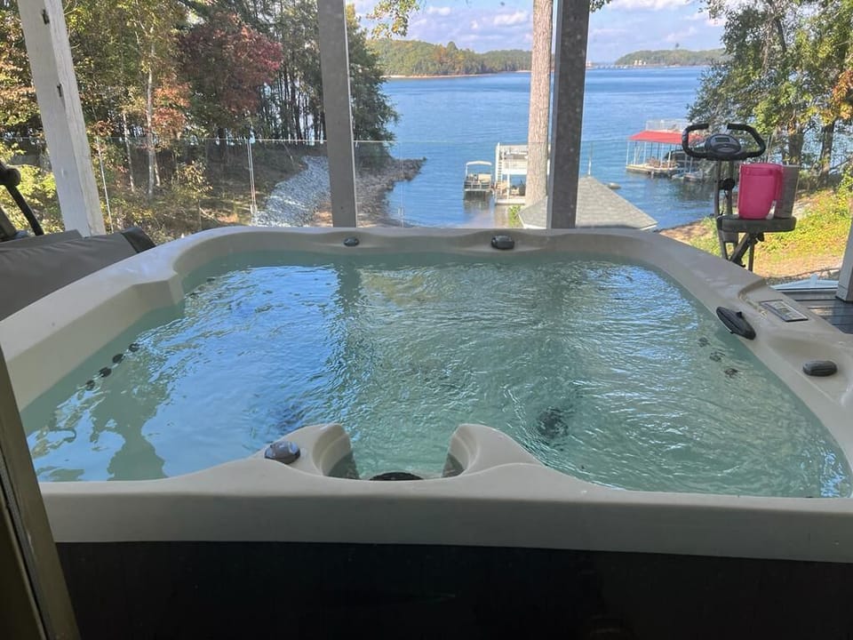 Hot tub on the deck with water view
