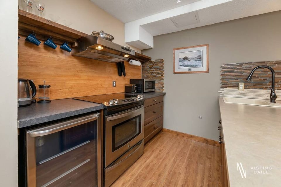 Full kitchen with a drip coffee maker, ground coffee, tea, sugar and basic condiments (ketchup/mustard/relish.)