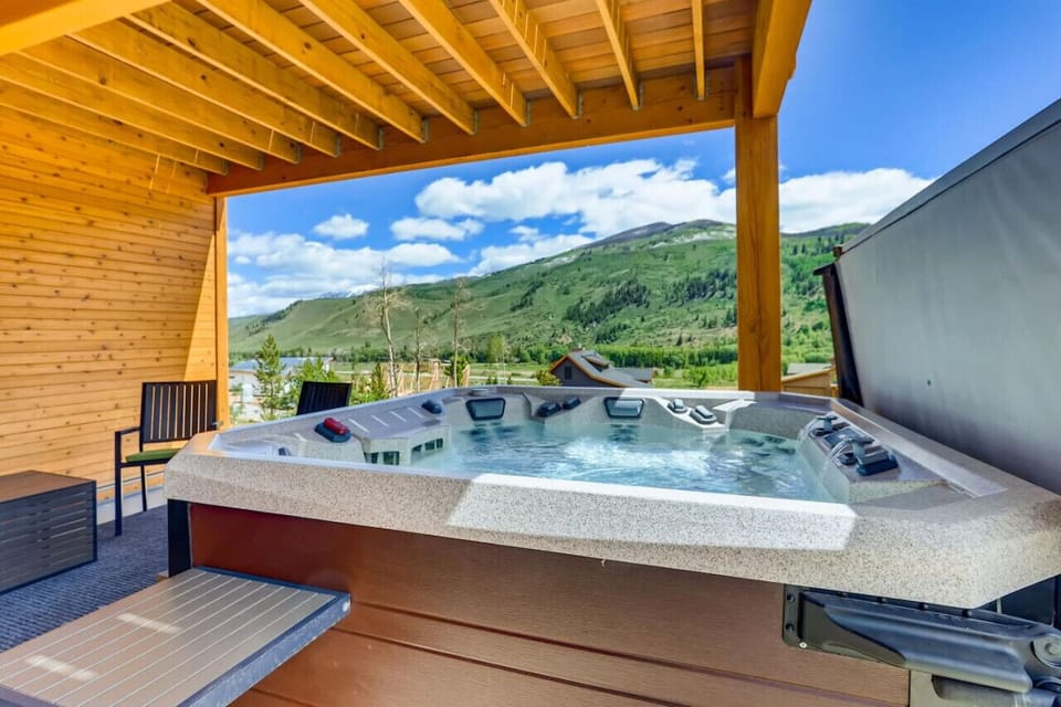Private hot tub offering mountain views from the downstairs patio