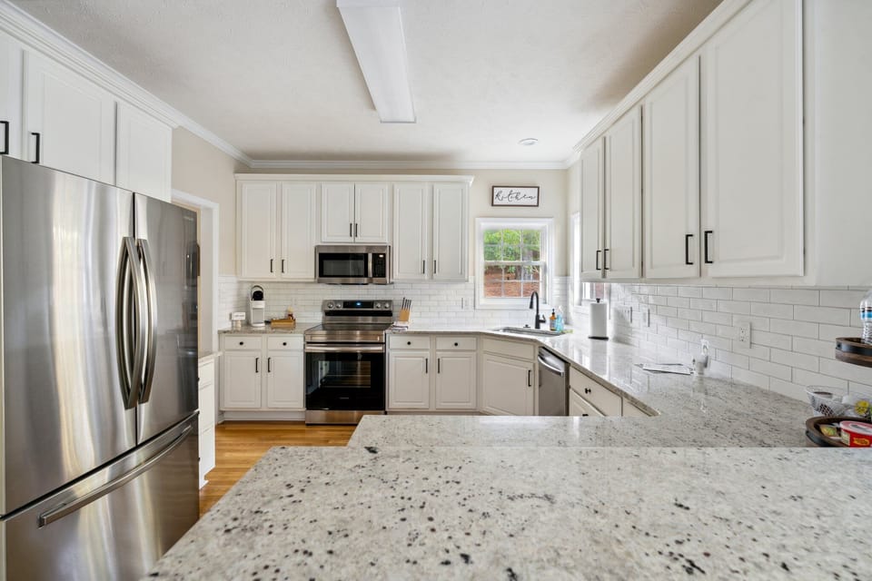 Chef-ready kitchen appointed with stainless appliances and ample prep space.