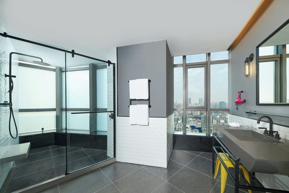 Shower, free toiletries, hair dryer, slippers