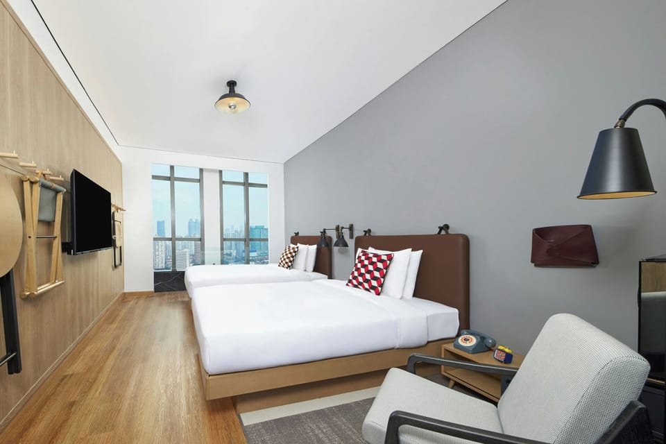 Standard Room, 2 Double Beds, City View | Down comforters, in-room safe, desk, blackout drapes
