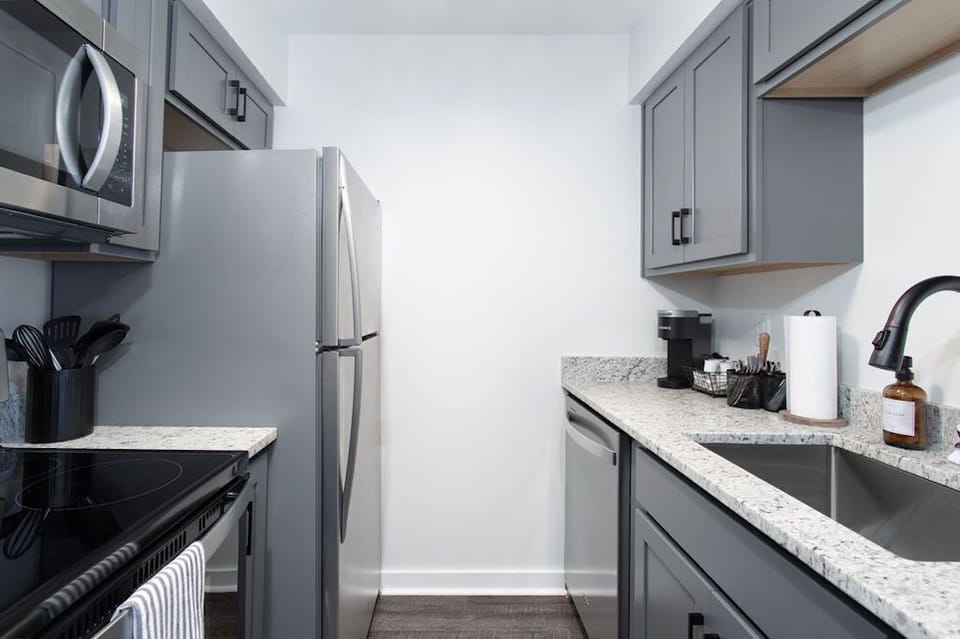 Full sized fridge, oven, stove, microwave and dishwasher