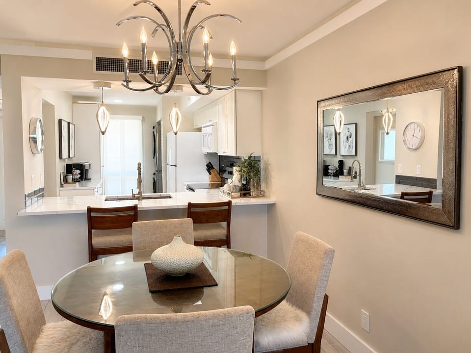 Dining for four, counter seating, all open concept to the renovated kitchen.