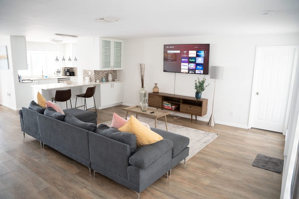 Living room with 55inch Smart TV with all the streaming options and board games