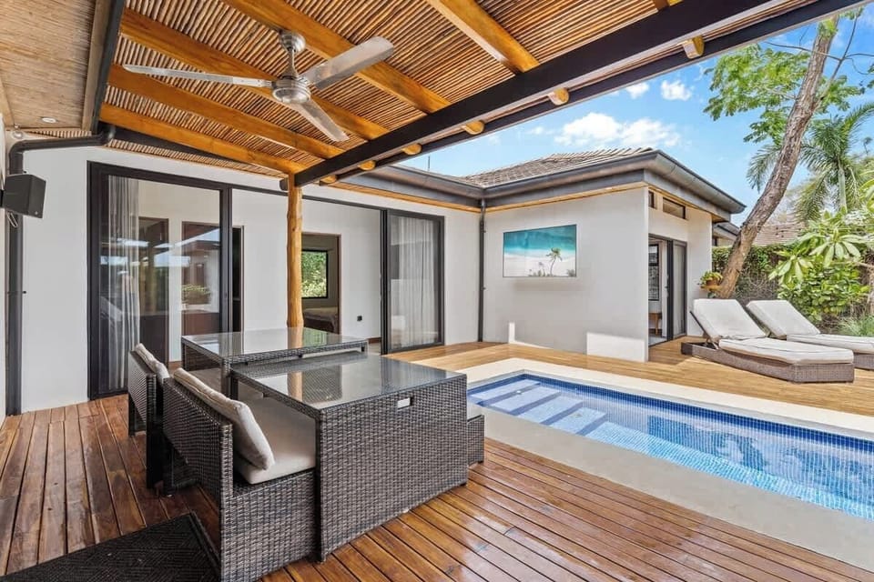 Covered terrace overlooking the private pool