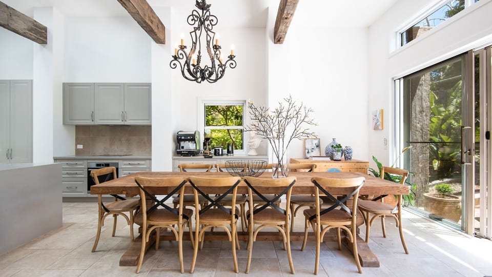 Crafted from rich, sturdy wood, this table is as beautiful as it is functional. Its generous size comfortably accommodates up to 10 guests.
