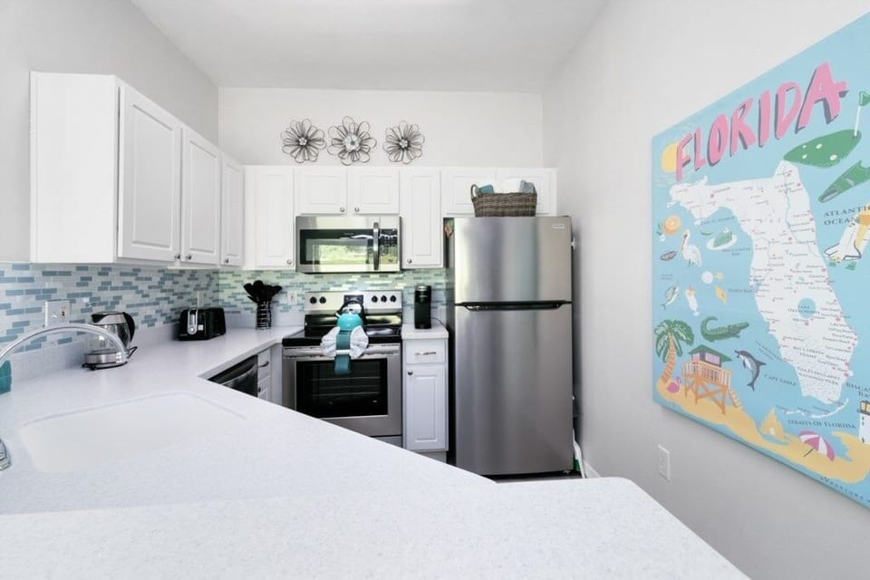Townhome, 4 Bedrooms | Private kitchen | Fridge, microwave, dishwasher, coffee/tea maker