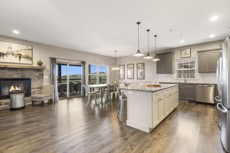 High end kitchen with stainless steel appliances and granite counter tops