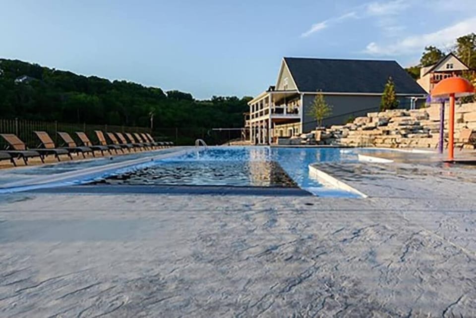 Outdoor pool with kids play area