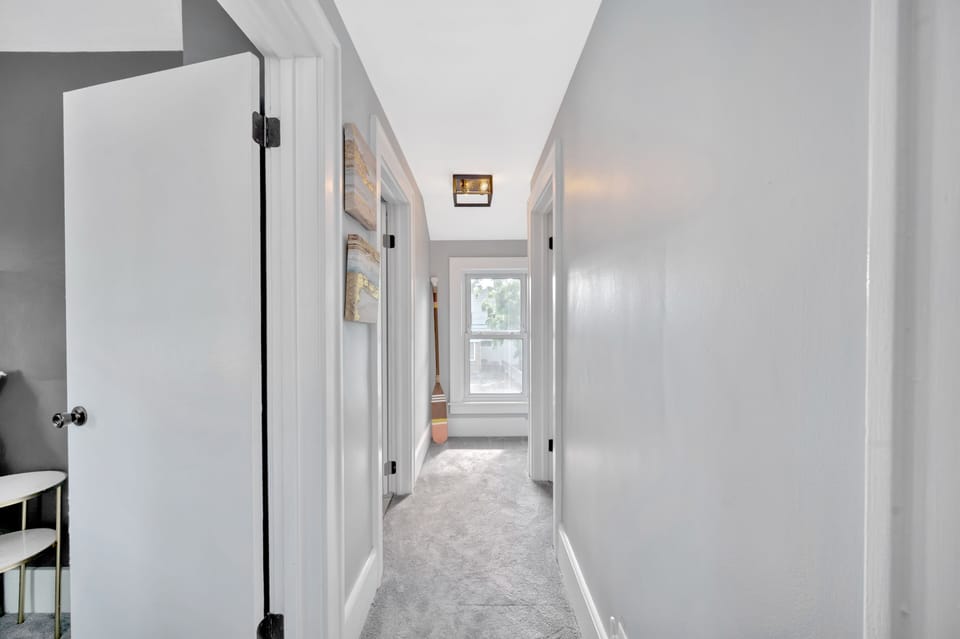 Upstairs Hall with three bedrooms and Bathroom