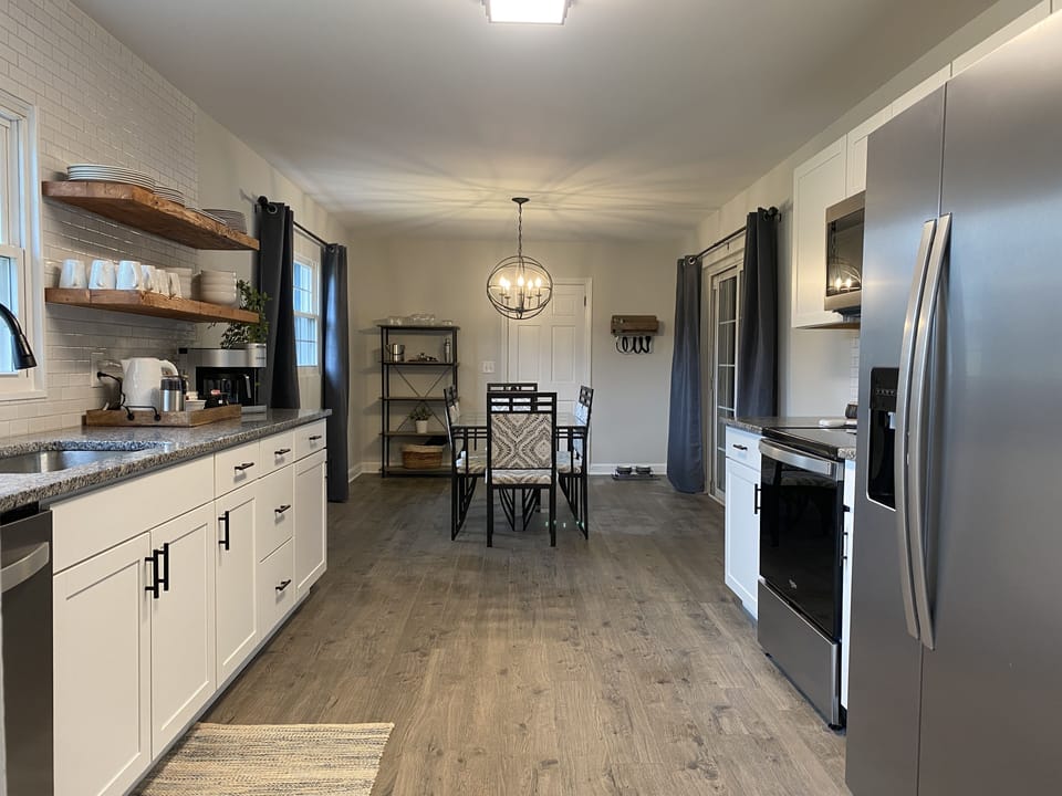 Completely remodeled kitchen is spacious, inviting and a perfect gathering place