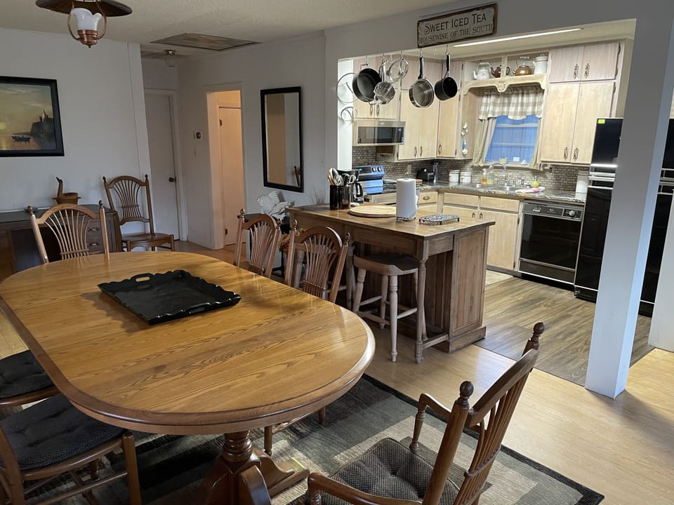 Dining room and kitchen.  Seating for 10 persons.