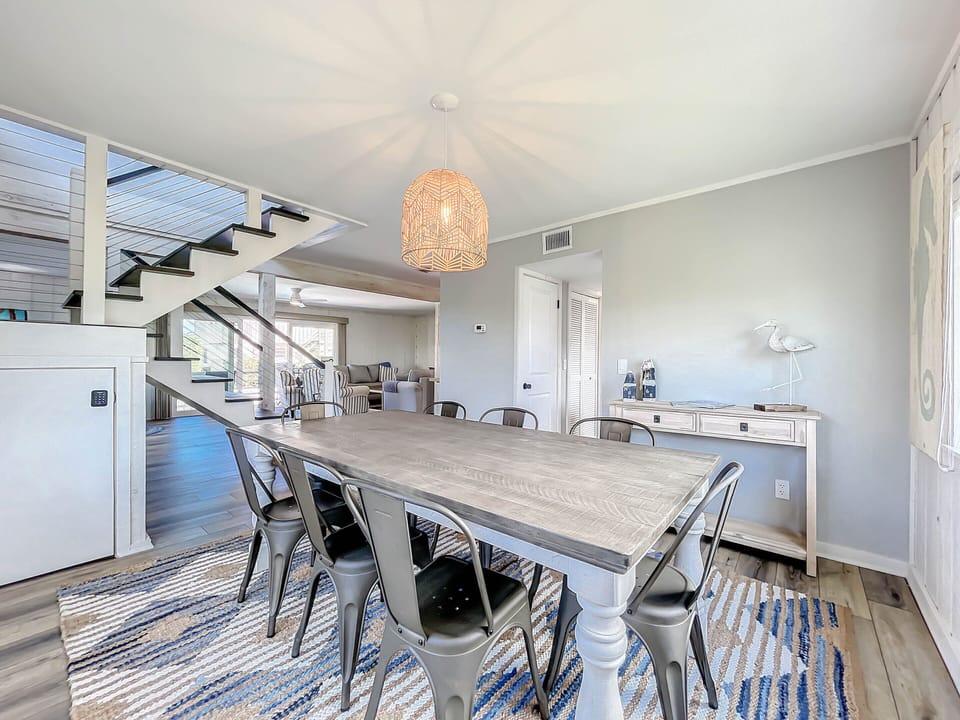 The dining table has room for 8 guests.