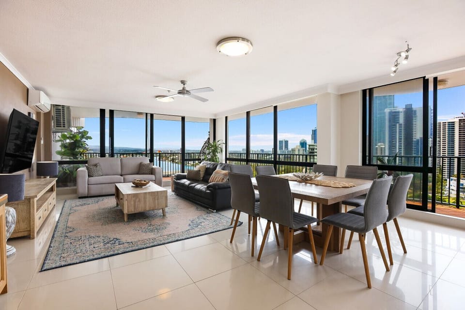 Open plan living and dining. Floor to ceiling glass for added light