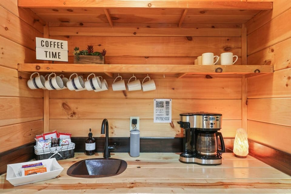 Fully stocked coffee bar with variety of teas to enjoy.