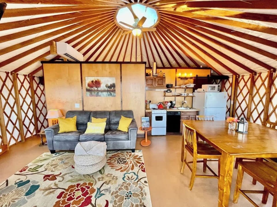 This unique yurt 450 sq ft has everything you need. Large refrigerators, full kitchen, pots and pans, utensils, BBQ set.  