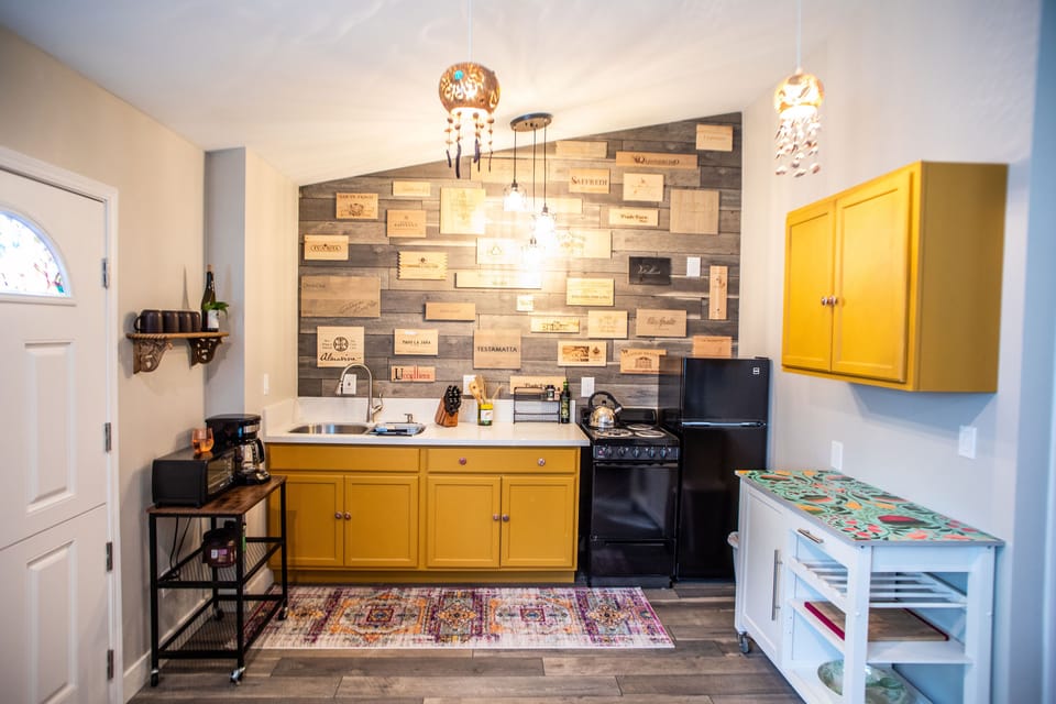 Kitchenette with custom 'wine wall'
